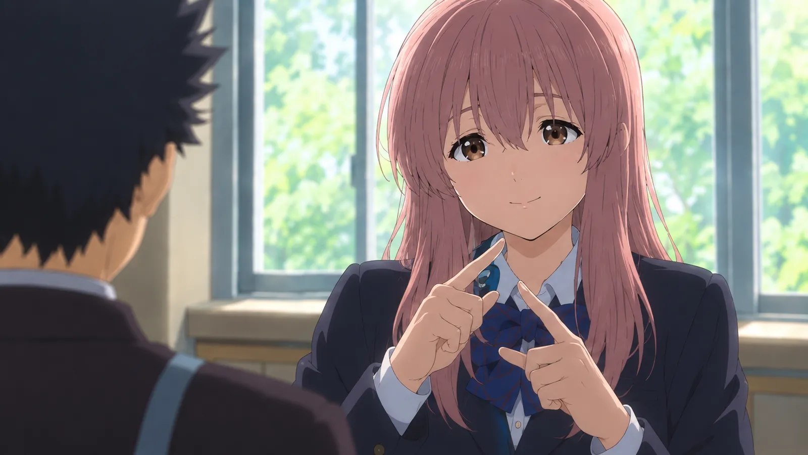 Shoko communicating through sign language in a quiet school setting